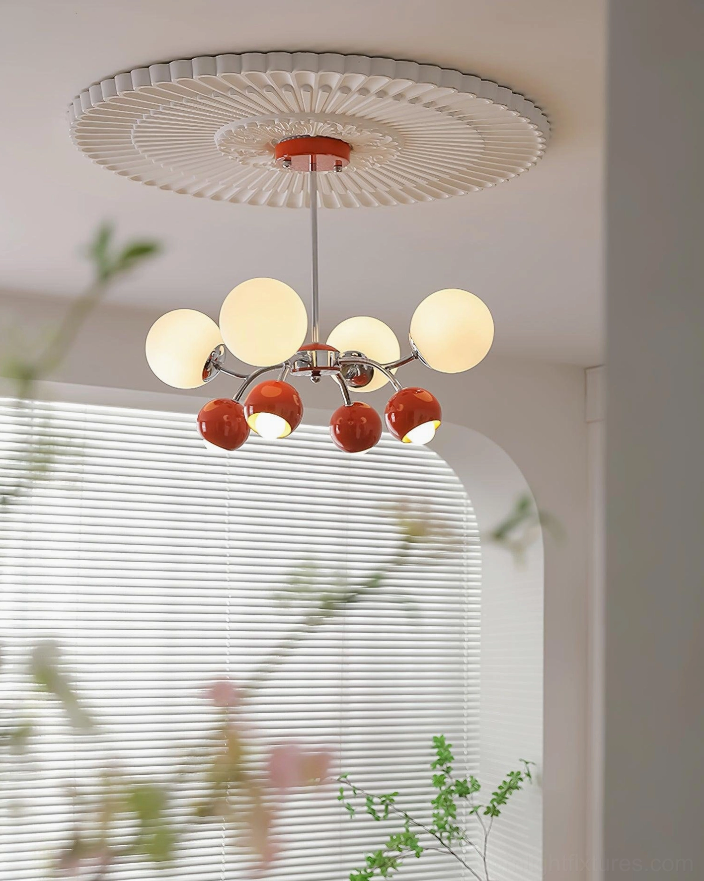Modern Sputnik chandelier closeup showing frosted glass globe detail and chrome metal arm construction