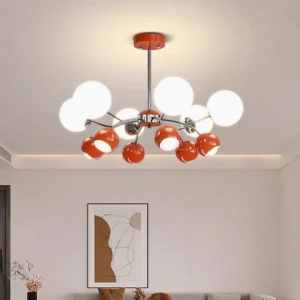 Sputnik pendant light fixture installed in minimalist living room, warm ambient lighting from frosted glass shades, chrome canopy detail