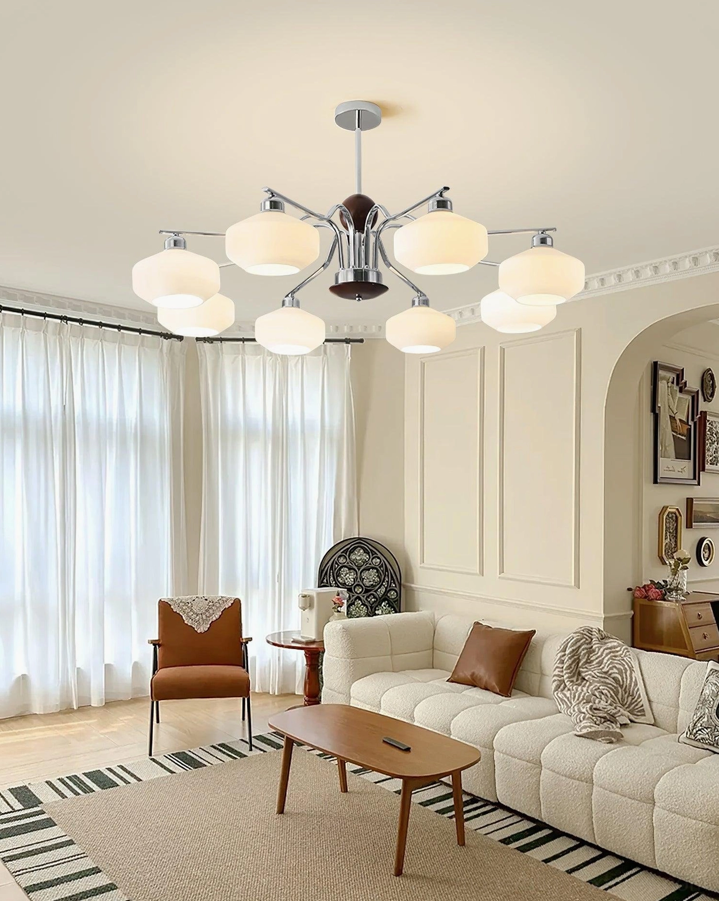 Mid-century sputnik chandelier in luxury living room with milky glass shades and chrome frame