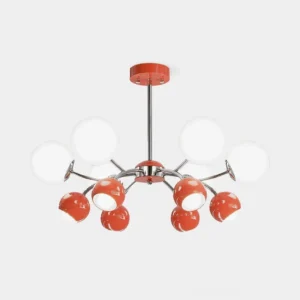 Modern Sputnik chandelier with dual-tone red and white frosted glass globe shades on chrome metal frame, flat lay product photography