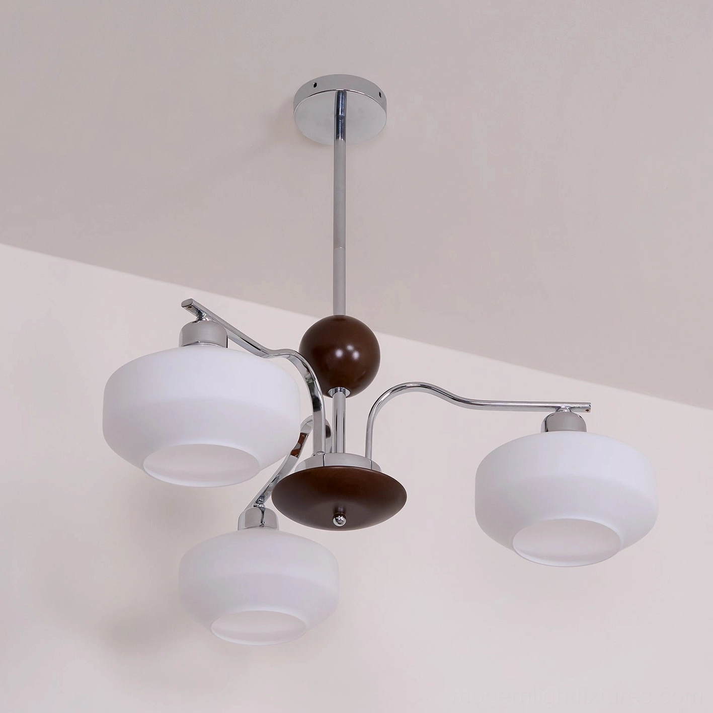 Sputnik chandelier side profile view highlighting polished chrome frame construction quality