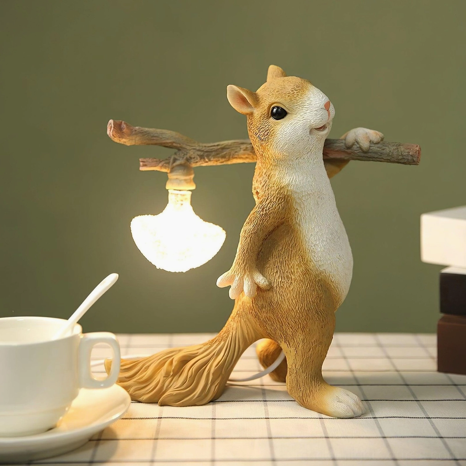 Squirrel table lamp on bedside table, nightstand lighting with warm glow and charming character
