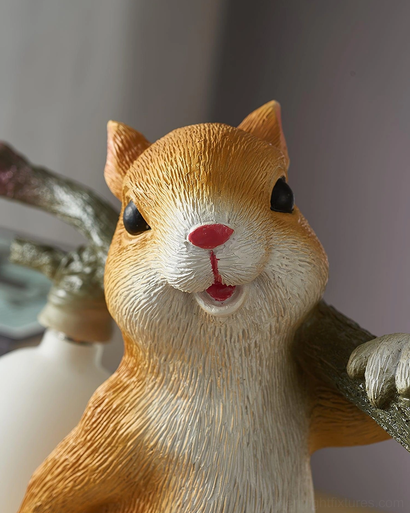 Squirrel resin lamp in contemporary interior, showing versatility with modern minimalist home decor