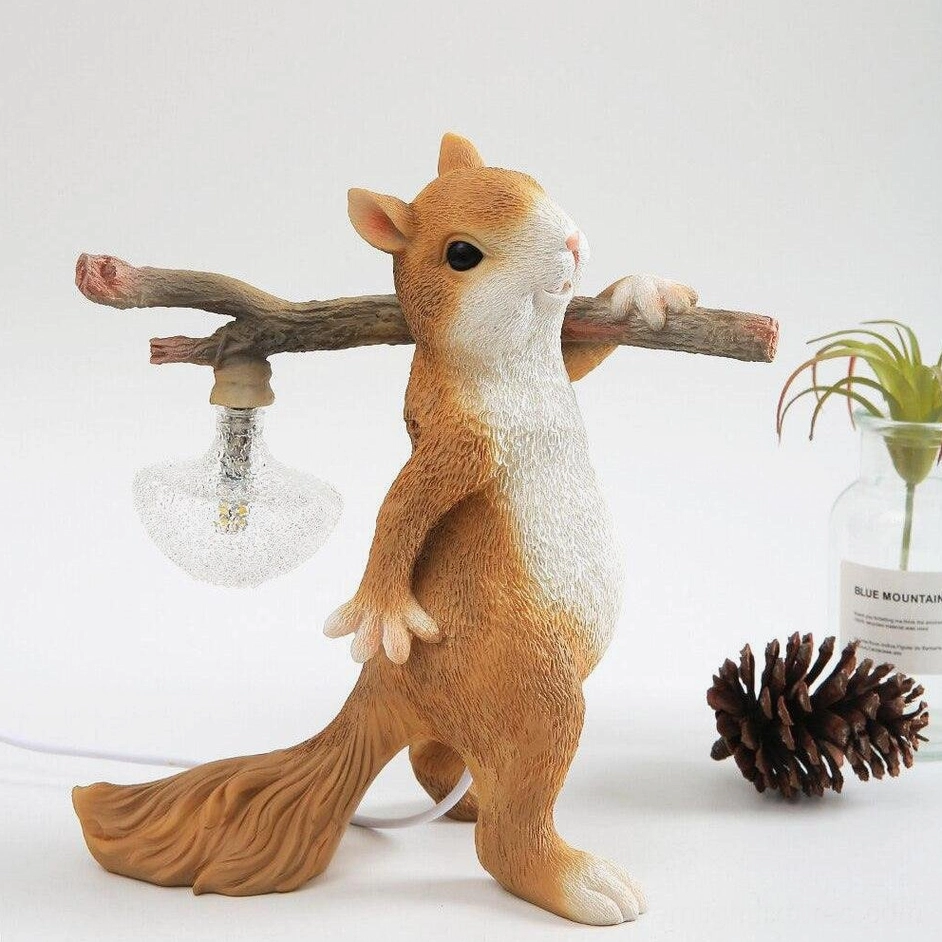 Orange white squirrel resin lamp, nature-inspired table lighting for modern farmhouse interiors