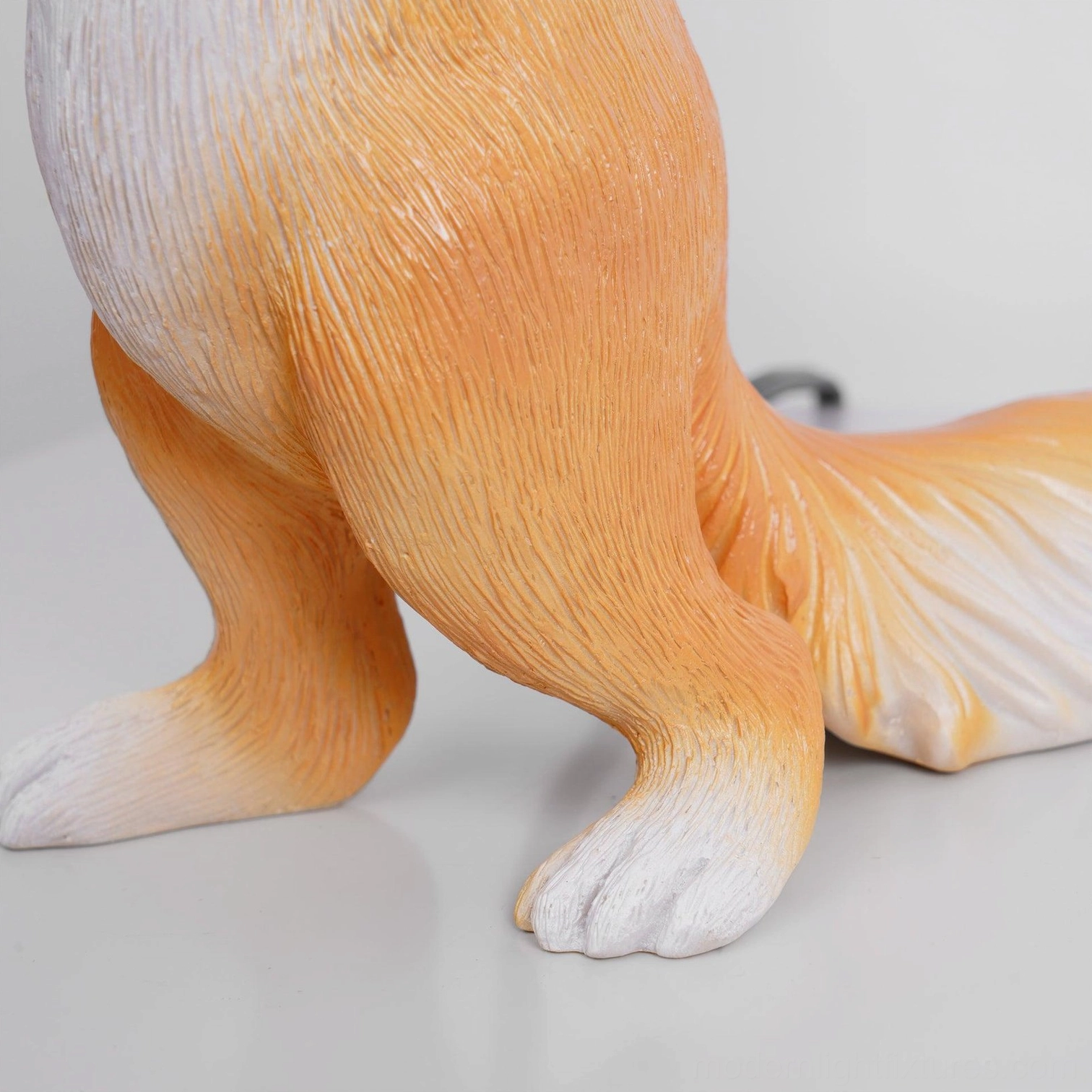 Decorative squirrel lamp in eclectic home office, adding personality to workspace with artistic design