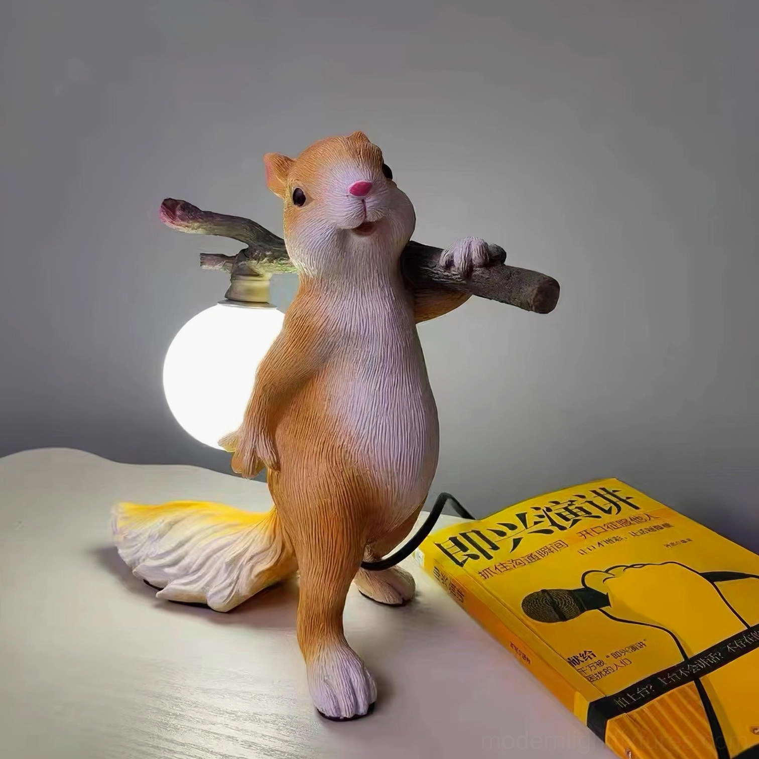 Orange and white squirrel table lamp with push-button switch, easy-to-use decorative lighting