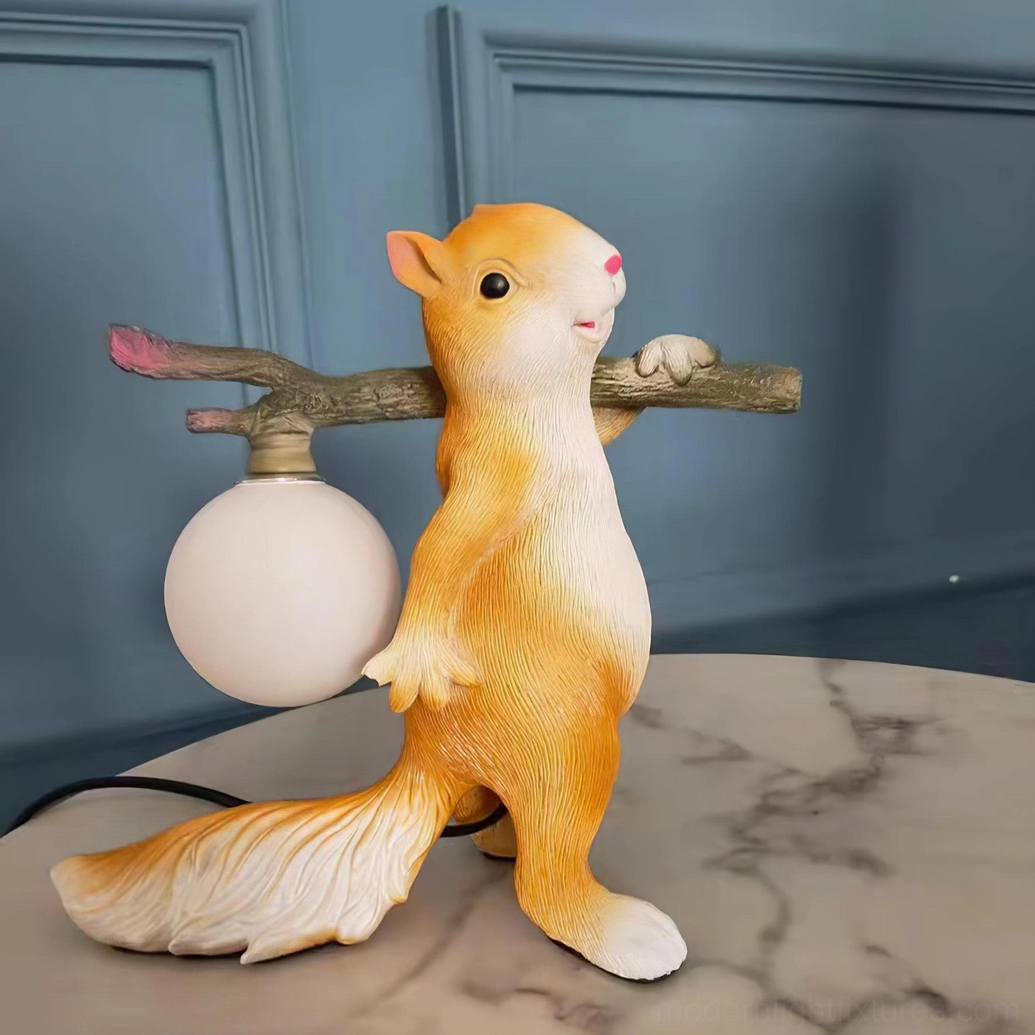 Squirrel resin table lamp in Scandinavian interior design, minimalist wildlife-inspired decor