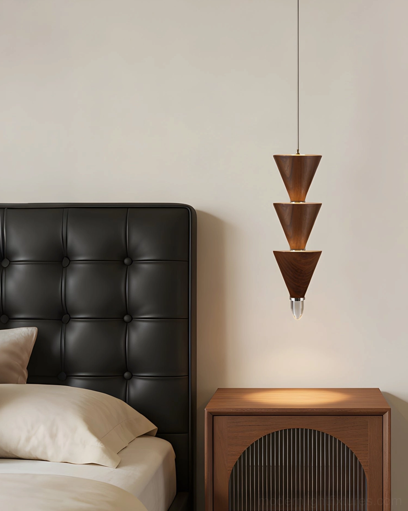 Stacked cone pendant light in bedroom setting beside wooden nightstand with tufted headboard