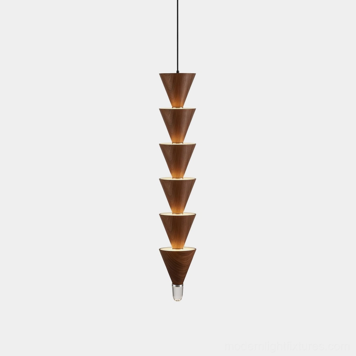 Stacked cone pendant light with walnut wood finish and integrated LED bands, front studio view