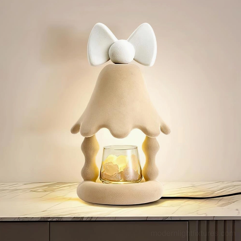 Multiple Stacy candle warmer lamps in different finishes displayed together showing available color options and sizing variety