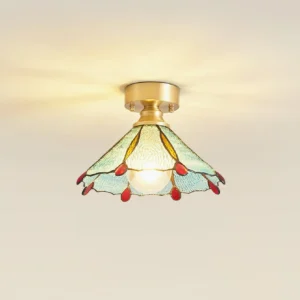 Overhead view of retro stained glass flush mount ceiling fixture with warm ambient light