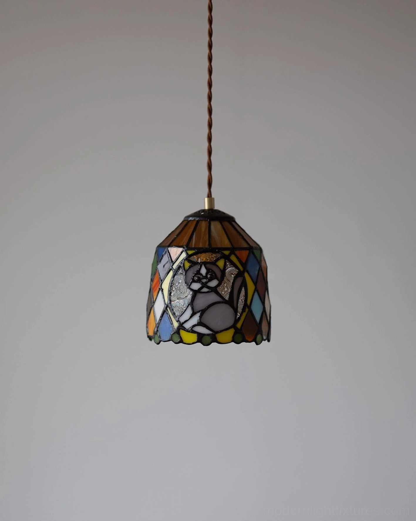 Stained glass pendant light showing meticulous glass cutting and soldering craftmanship