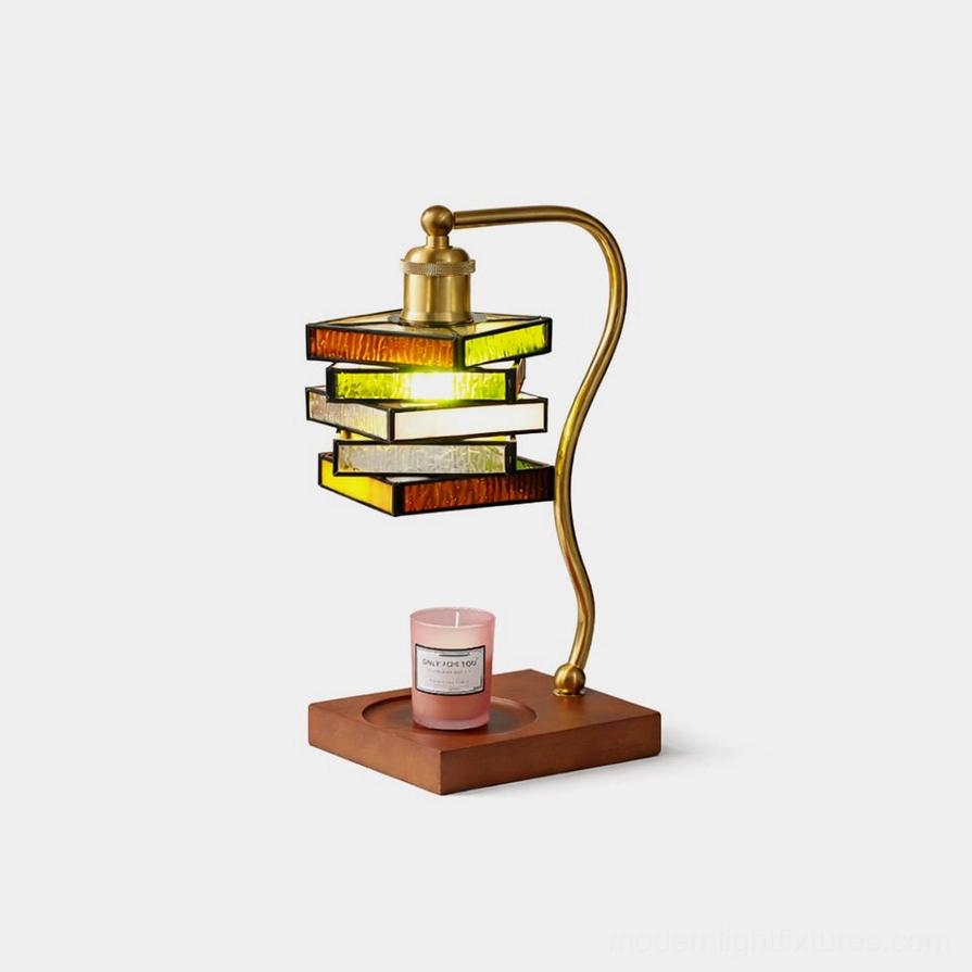 Vintage stained glass table lamp with brass curved arm and wood base, front three-quarter view showcasing amber and rust colored glass panels