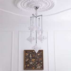 Contemporary crystal pendant chandelier displayed in elegant vintage-styled room with botanical wall art