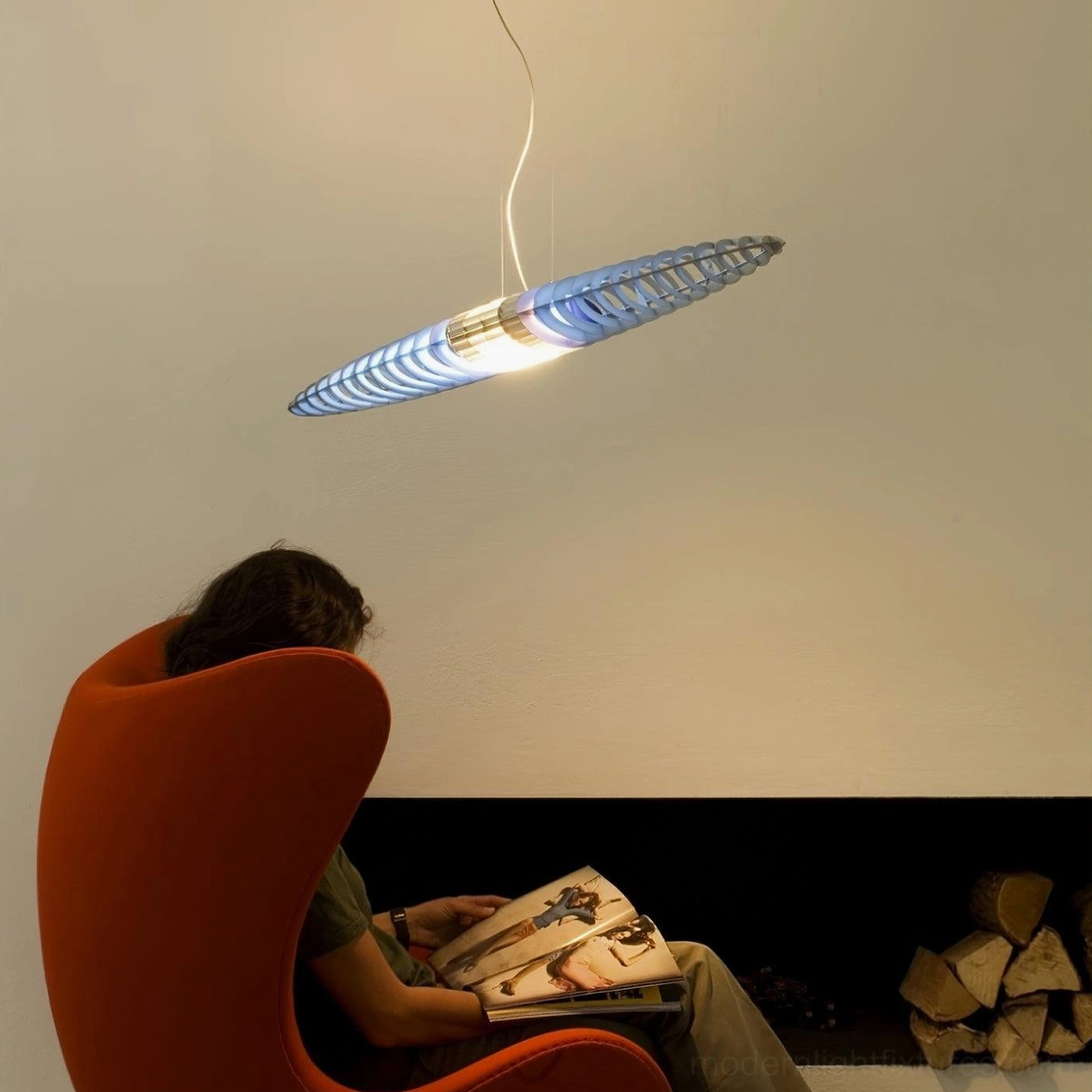 Star Ship chrome pendant fixture with geometric oval design in industrial modern setting