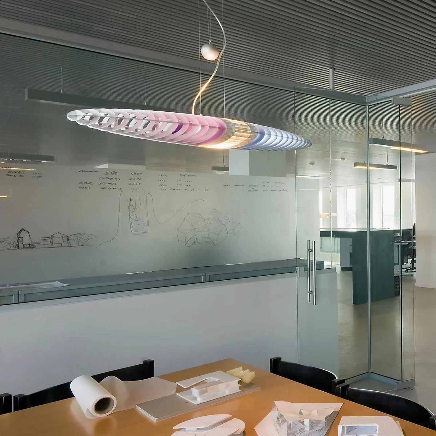 Star Ship pendant light with multi-color gradient slatted shade in corporate conference room
