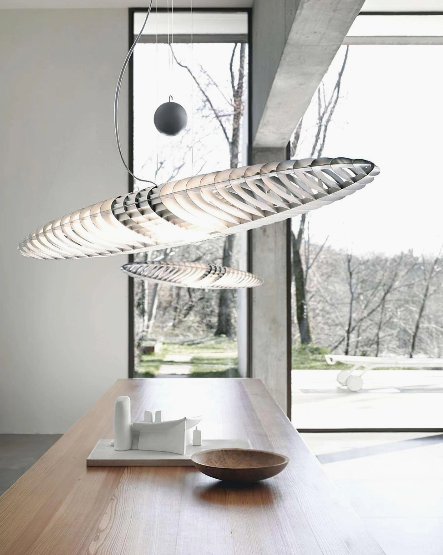 Star Ship modern chrome pendant light installation detail and shadow effect on ceiling
