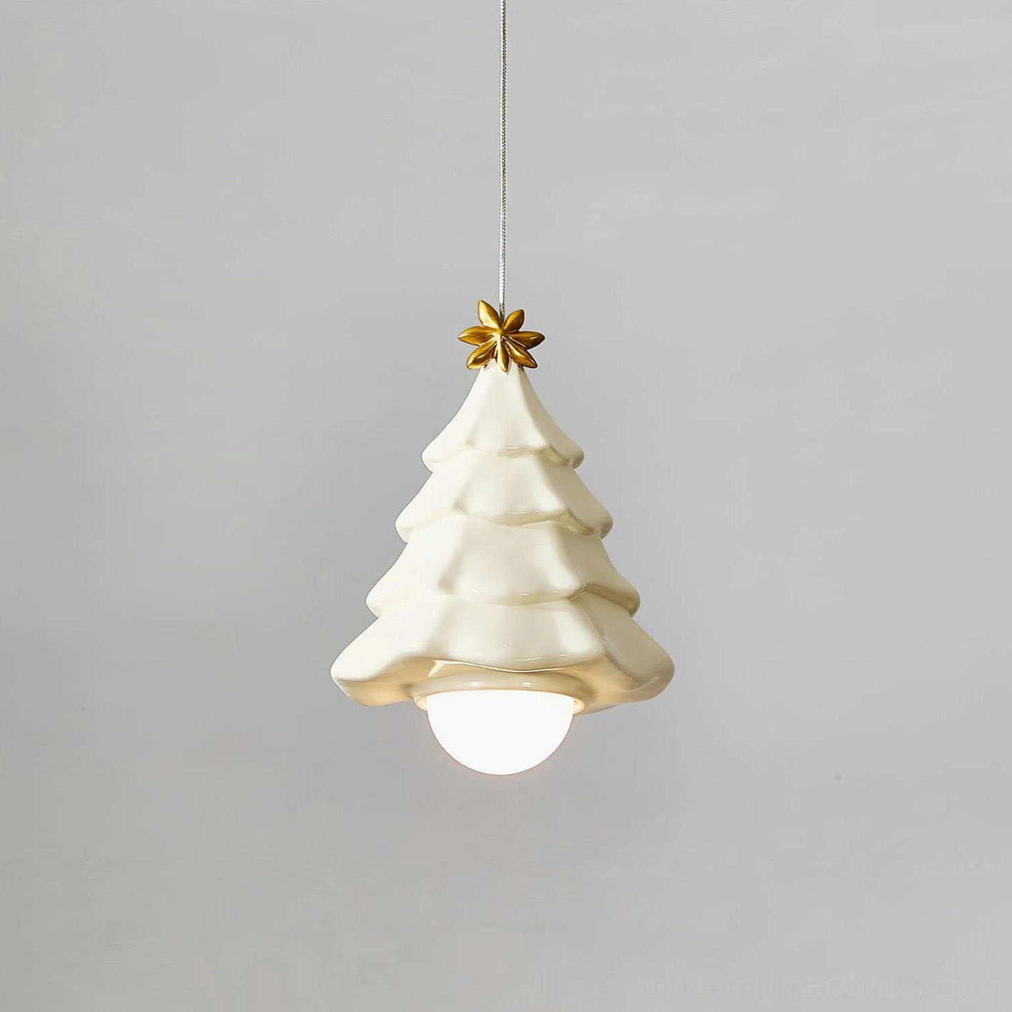 Cream beige Starlit Spruce ceramic pendant light front view with golden star decoration and white bulb, cute minimalist design