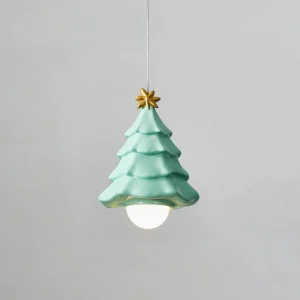 Mint green ceramic Christmas tree pendant light with golden star topper, oblique angle view showcasing sculptural form and glossy finish