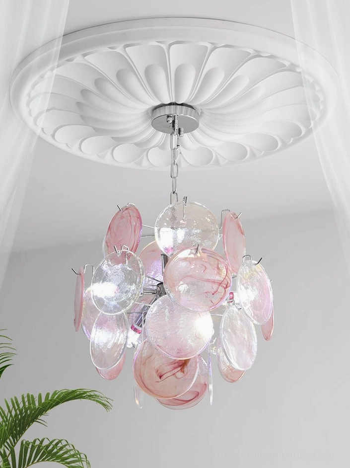 Modern glass disc pendant light in formal entryway showing statement piece presentation