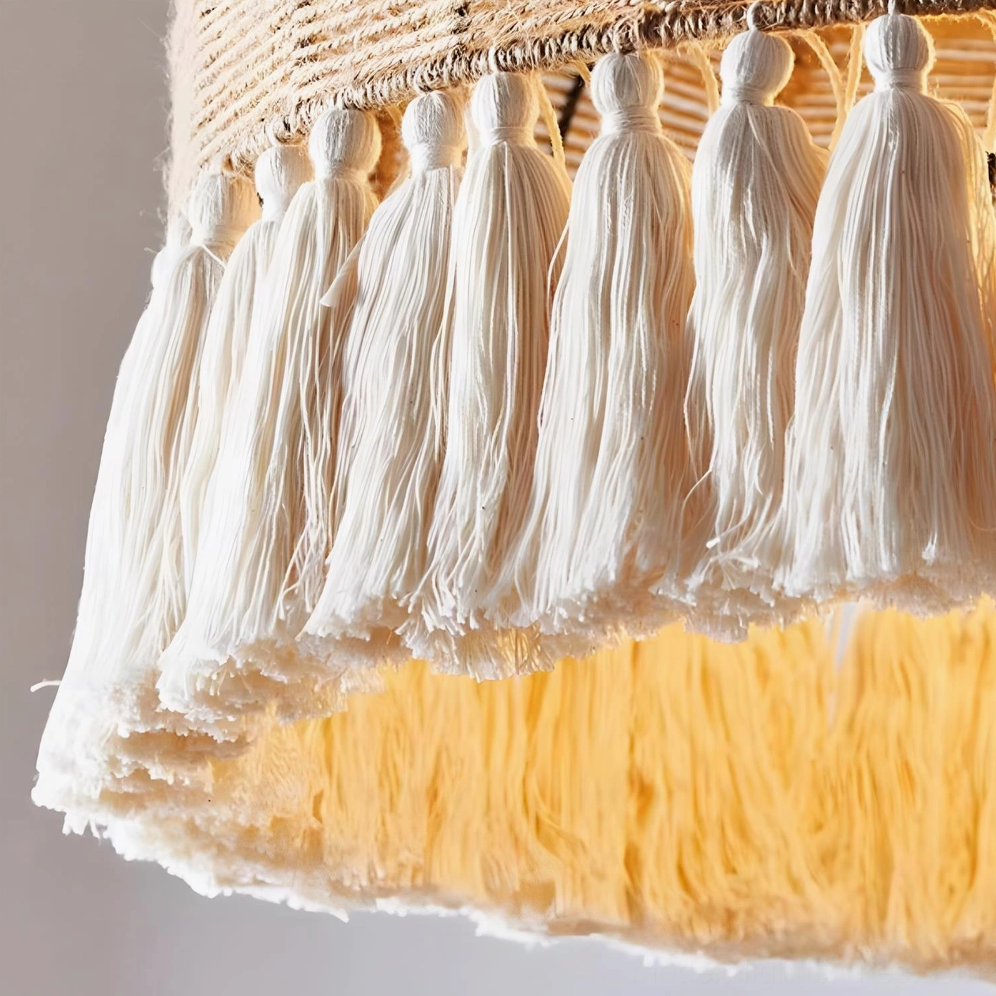 Statement rattan pendant light installation demonstrating size and scale in contemporary bohemian interior setting