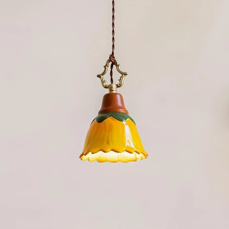 Stella pendant lamp ceramic shade detail shot, flower-shaped design on neutral background