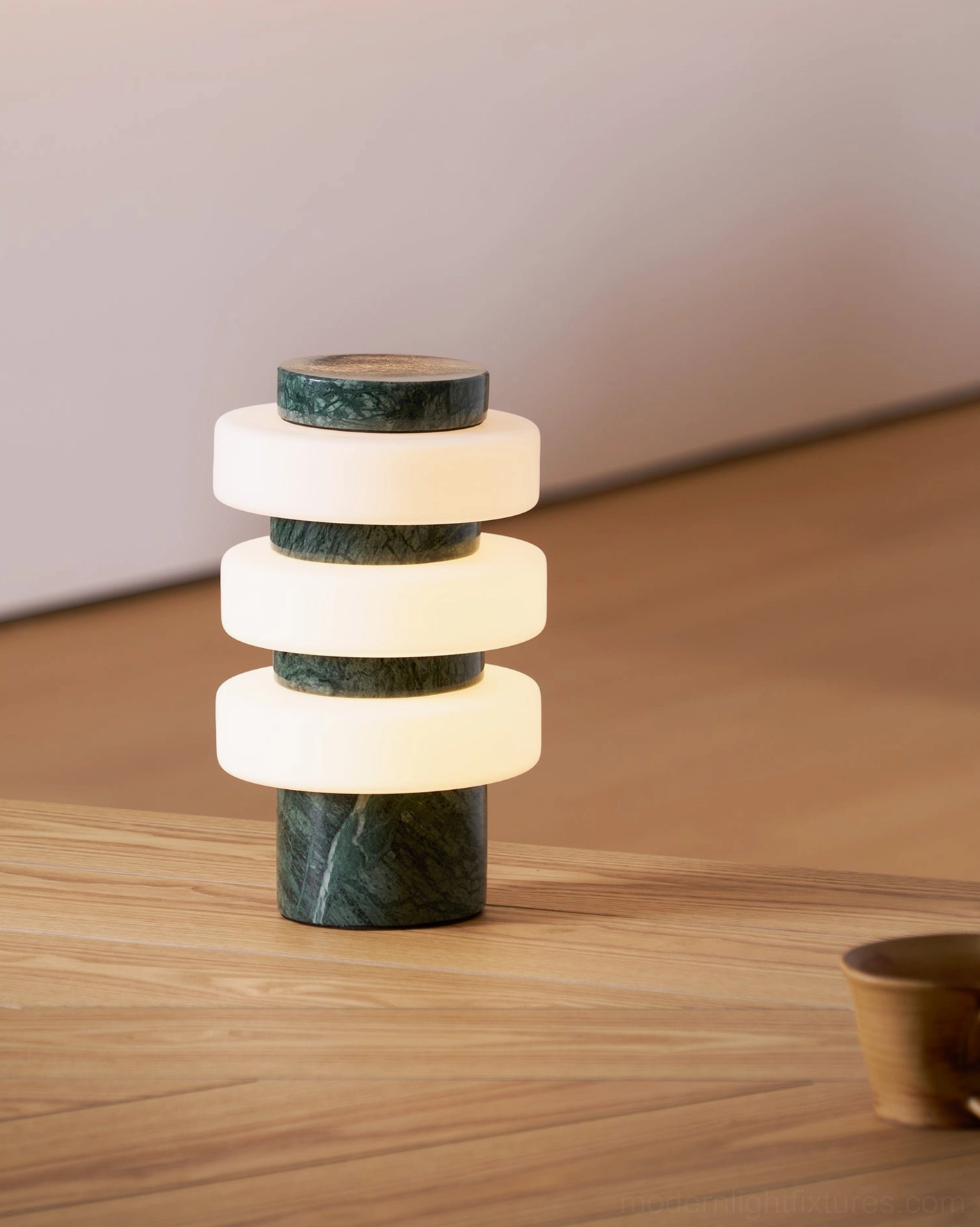 Strata modern accent table lamp in contemporary home interior demonstrating versatile placement options