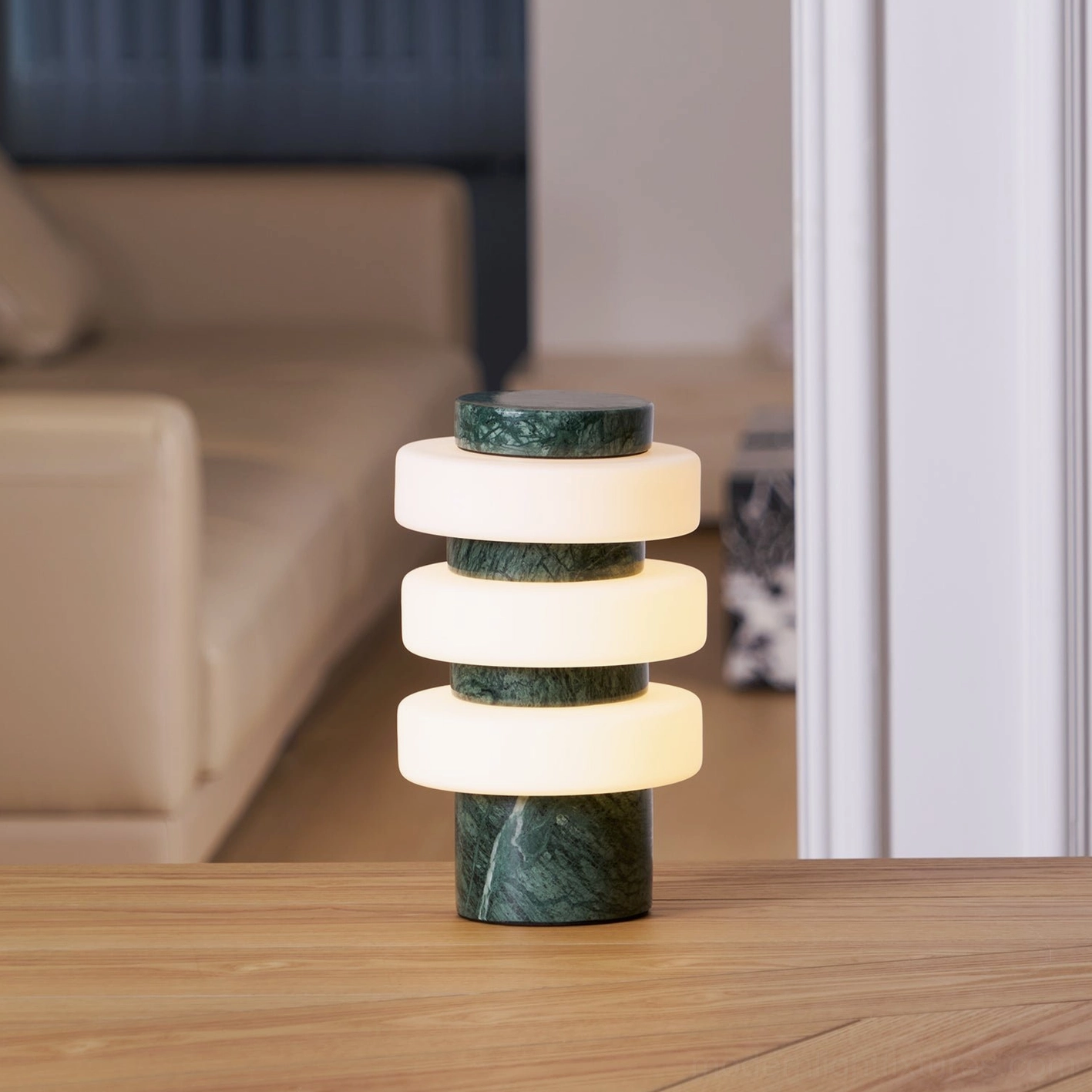 Contemporary strata table lamp showcasing integrated LED rings and three-color temperature options