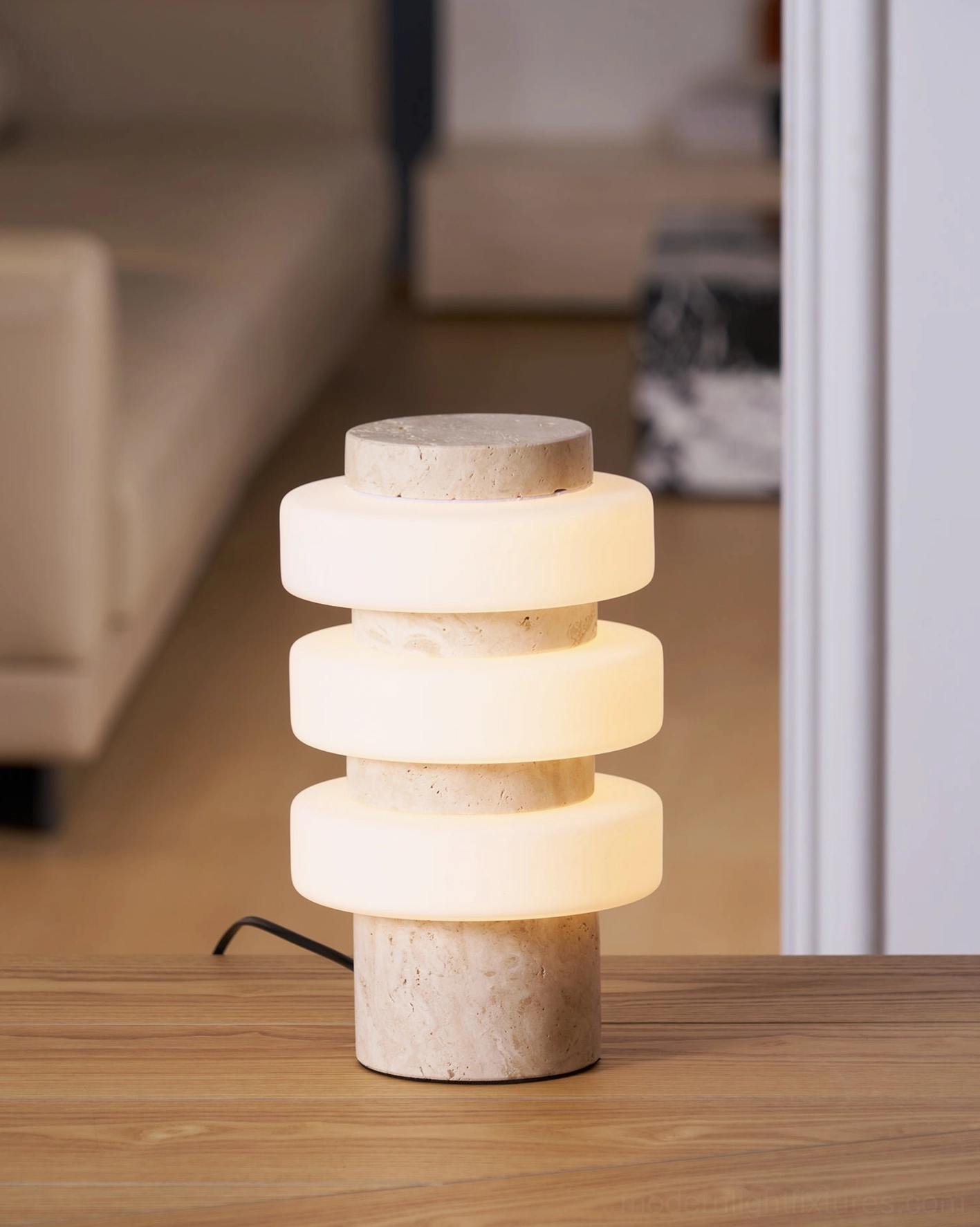 Strata travertine and acrylic table lamp showing material quality and modern minimalist design details