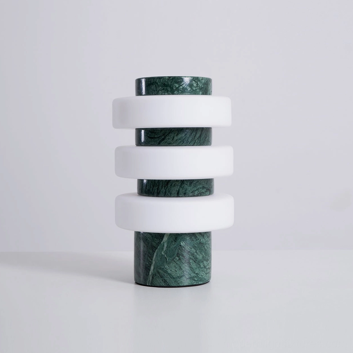 Strata table lamp in white and green marble variant showing color options and material variations