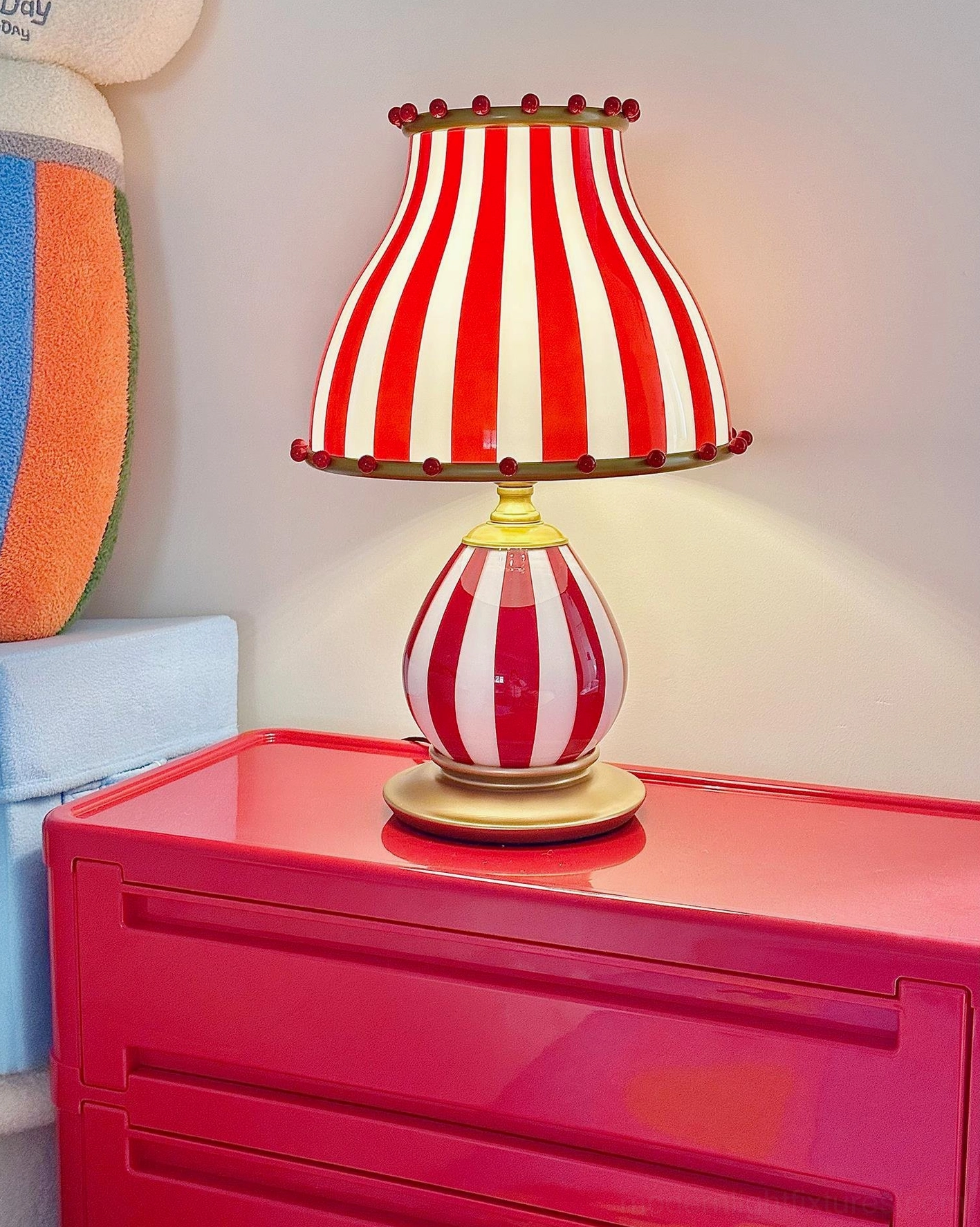 Striped carnival table lamp perfect for playful and eclectic room design