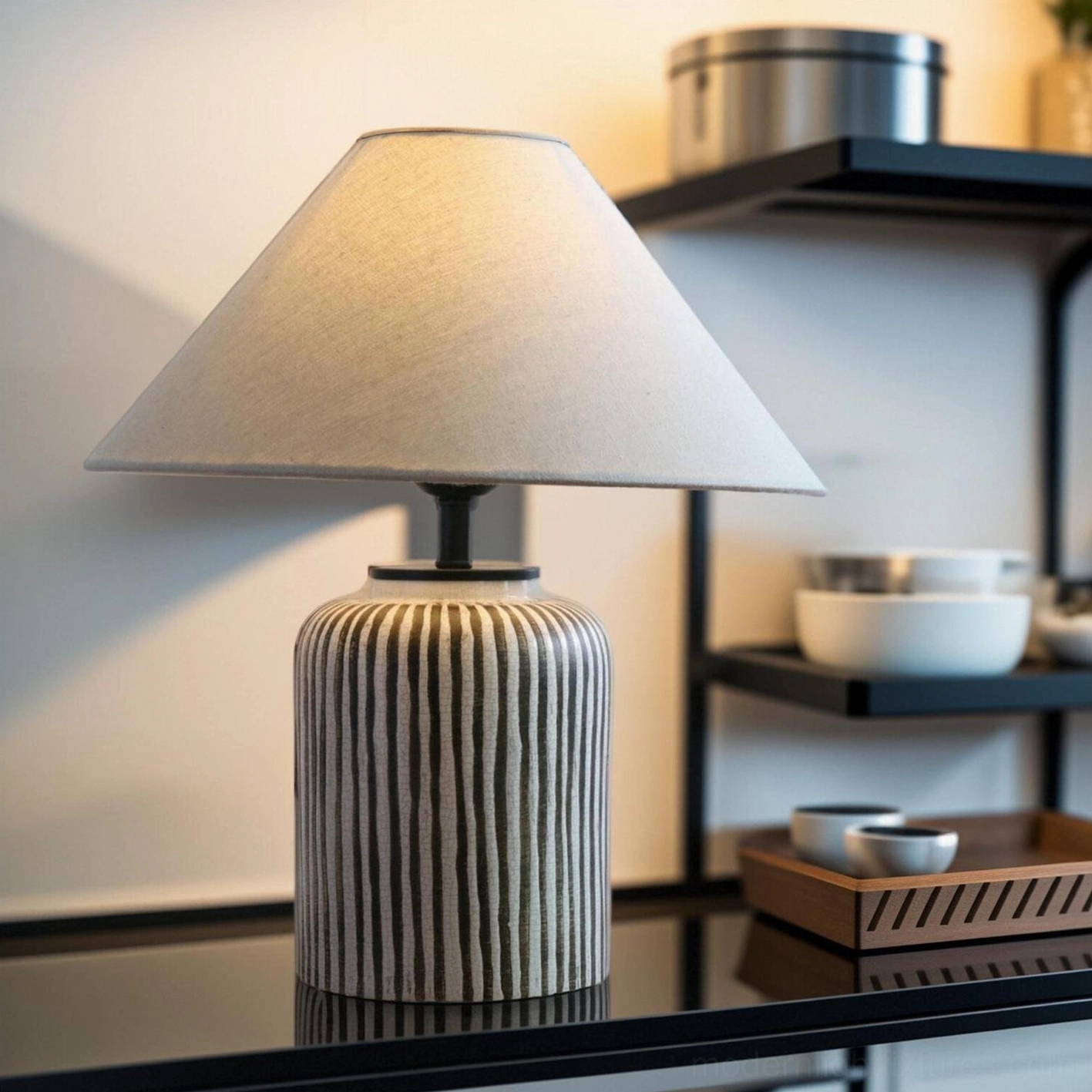Contemporary striped table lamp positioned on console table in minimalist modern interior styling