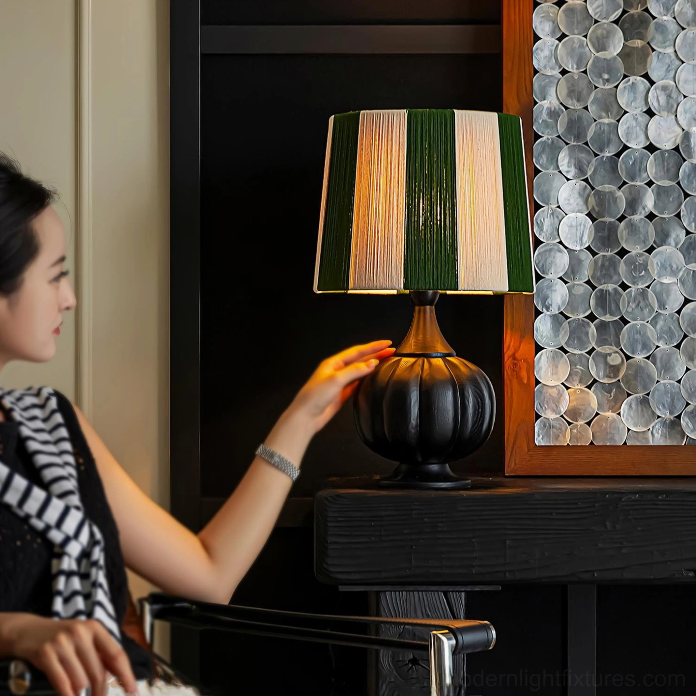 Striped wooden table lamp with sculptural pumpkin base showcasing premium wood grain and fabric details