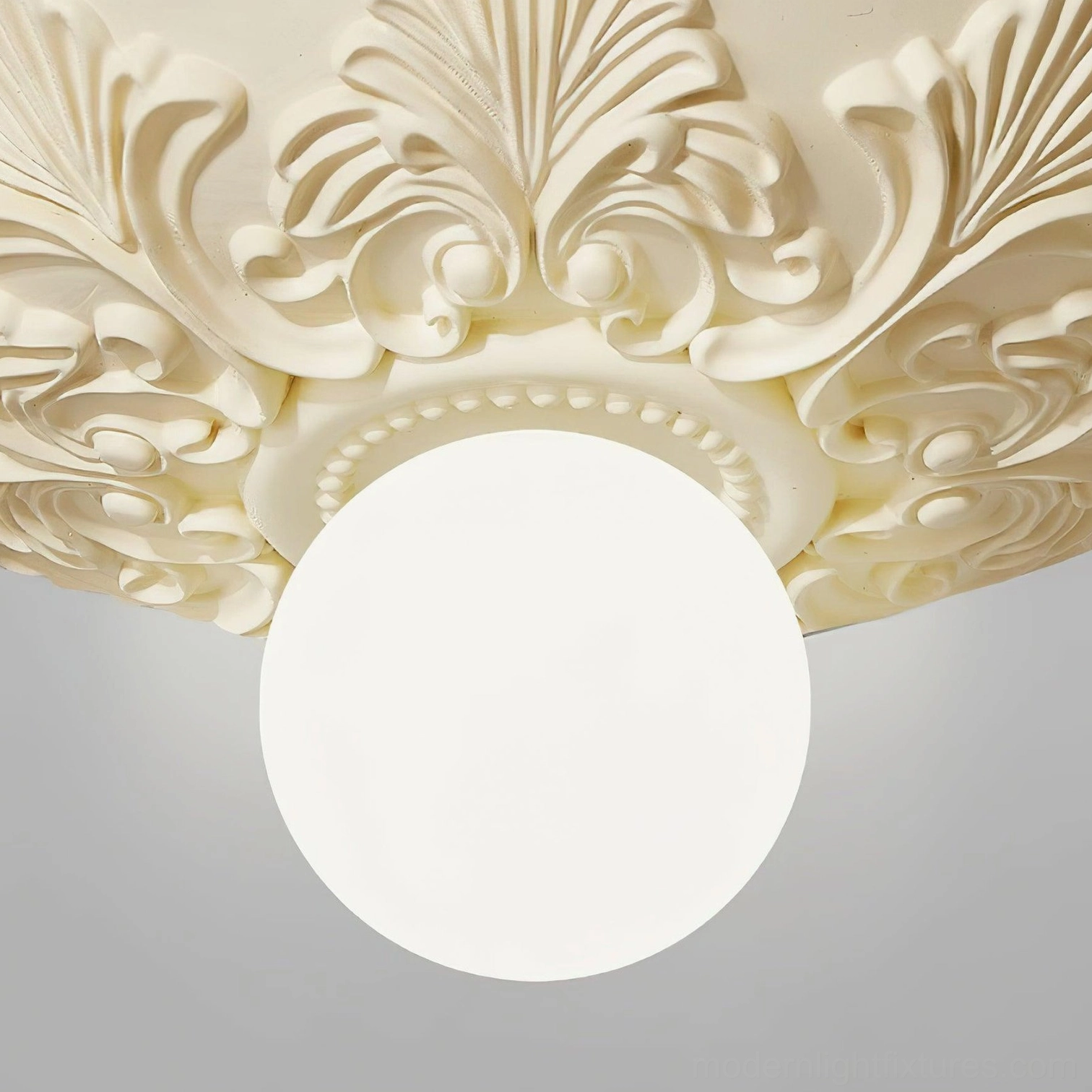 Suilven carved ceiling light showing European baroque heritage classical acanthus leaf design