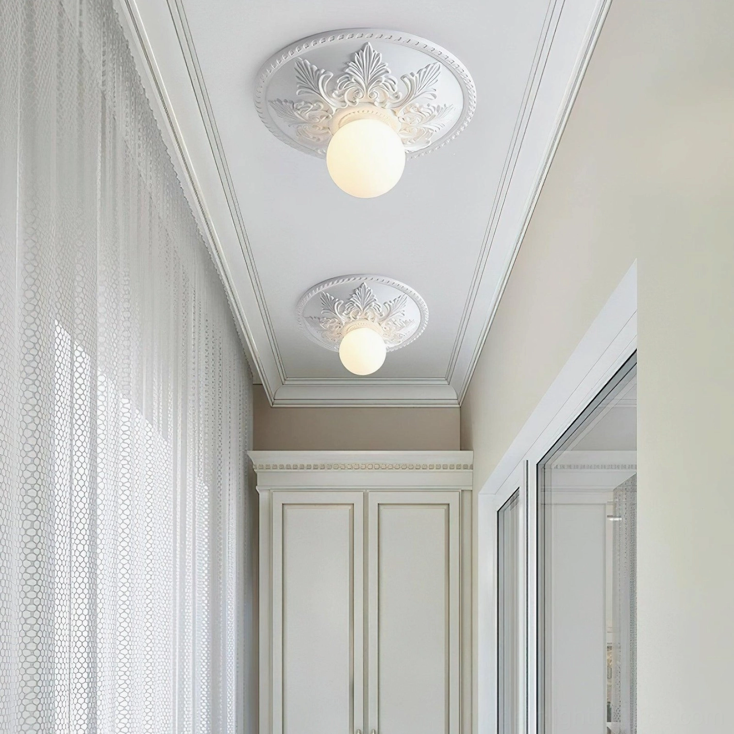 Suilven ornate ceiling light installed in contemporary room with classical accents and modern furnishings