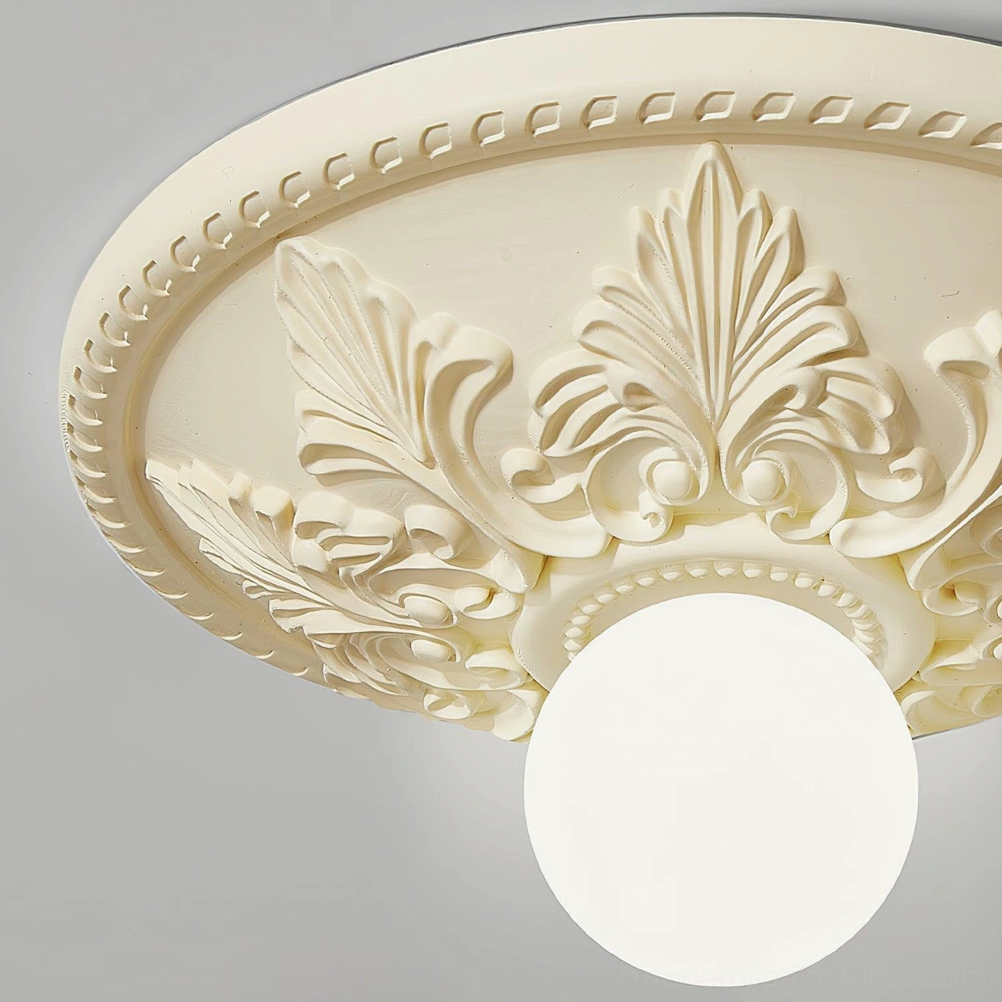 Suilven ornate ceiling light fixture artistic close-up showing frosted glass and carved resin artistry