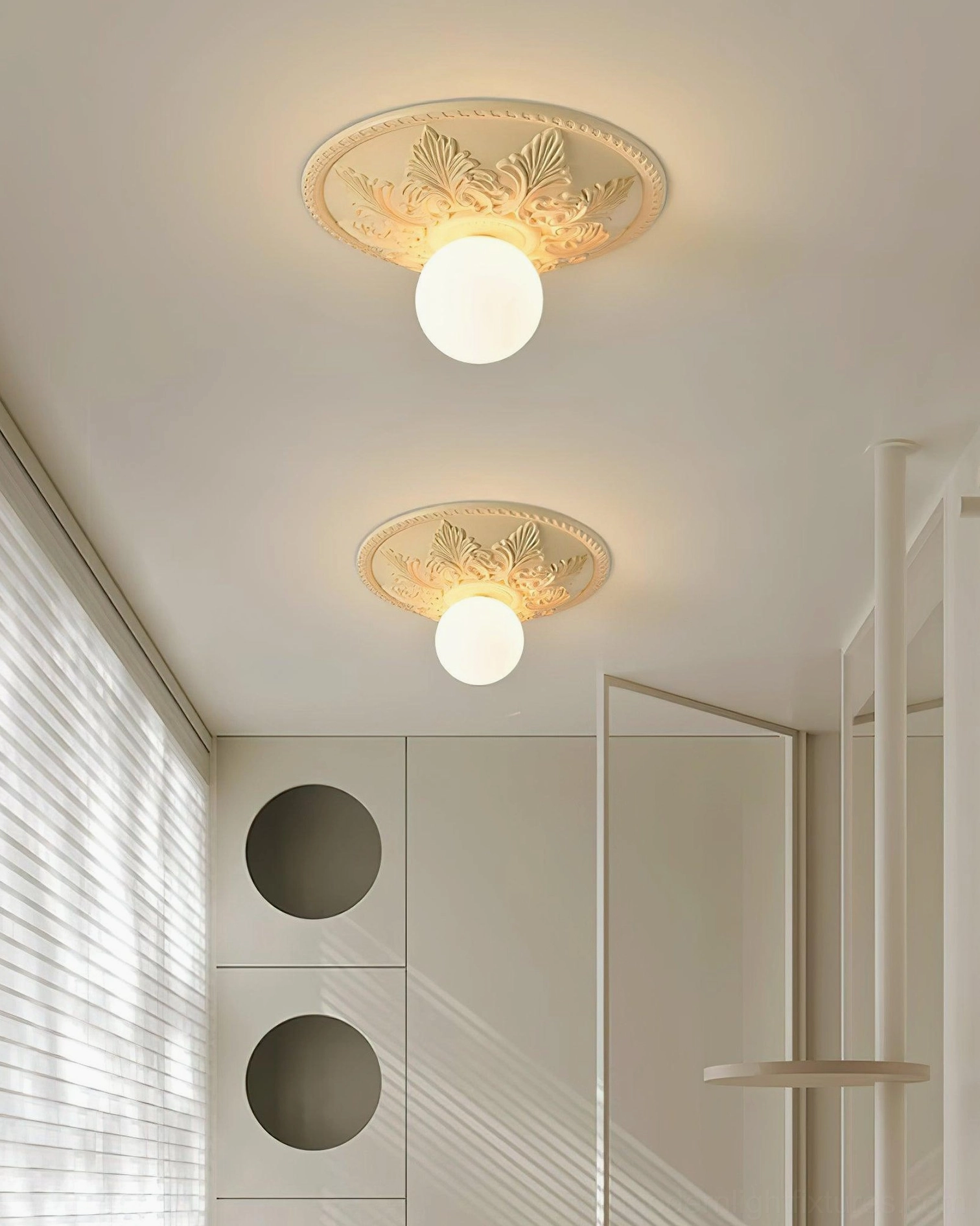 Suilven classical carved ceiling light in eclectic interior with collected design elements