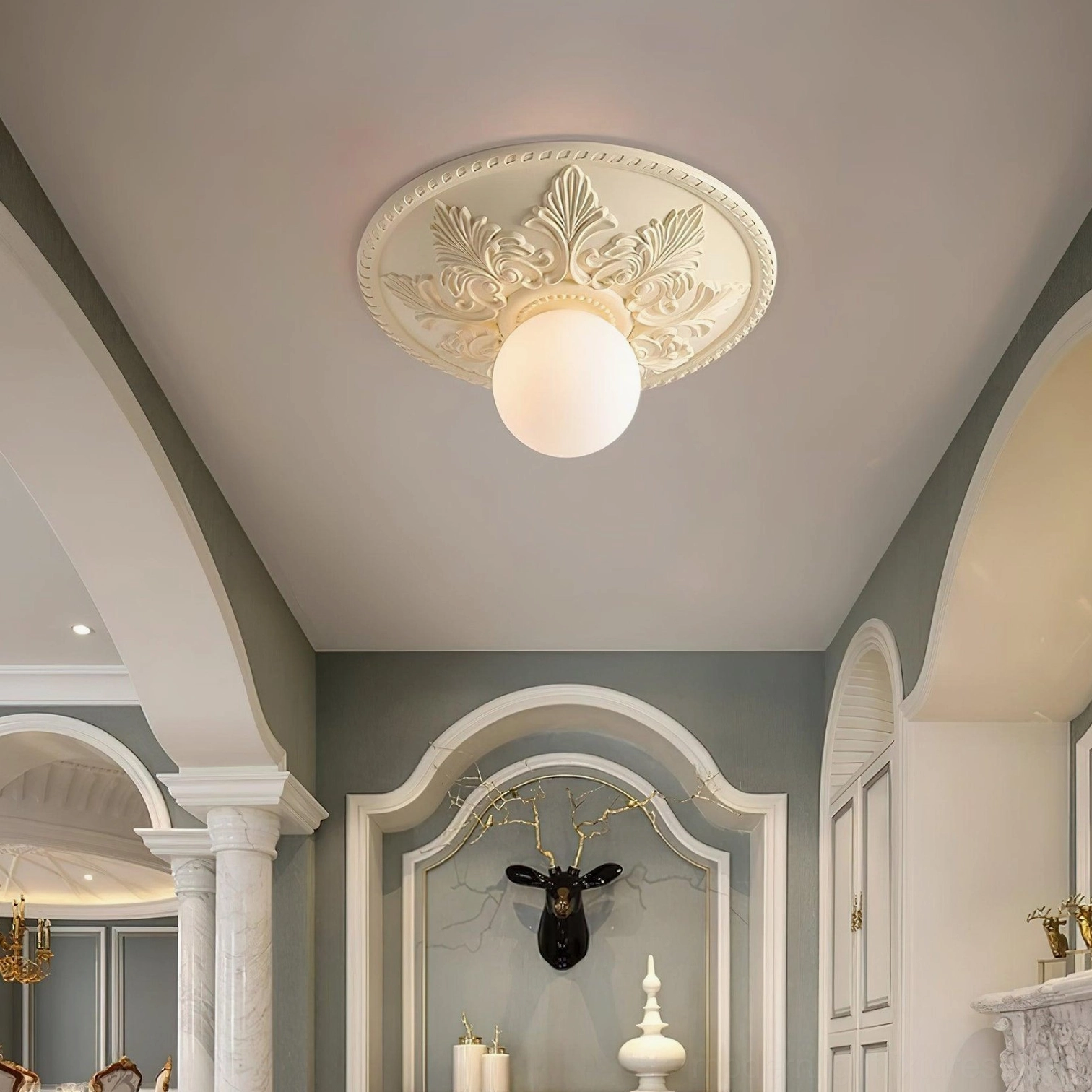 Suilven ceiling light installed in vintage arched entryway, warm ambient lighting, French classical style