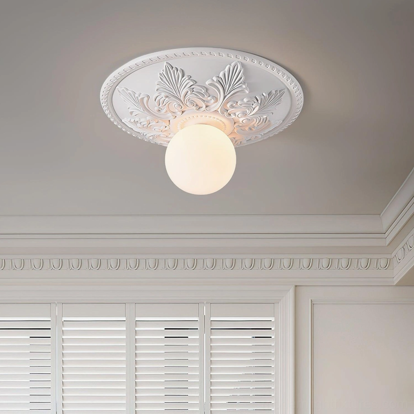 Suilven carved white ceiling light installed in hallway with built-in cabinet and warm matte white finish