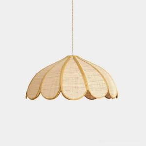 Sukina organic woven pendant light with scalloped raffia shade, front view studio shot showing petal-shaped natural fibers and warm beige tone