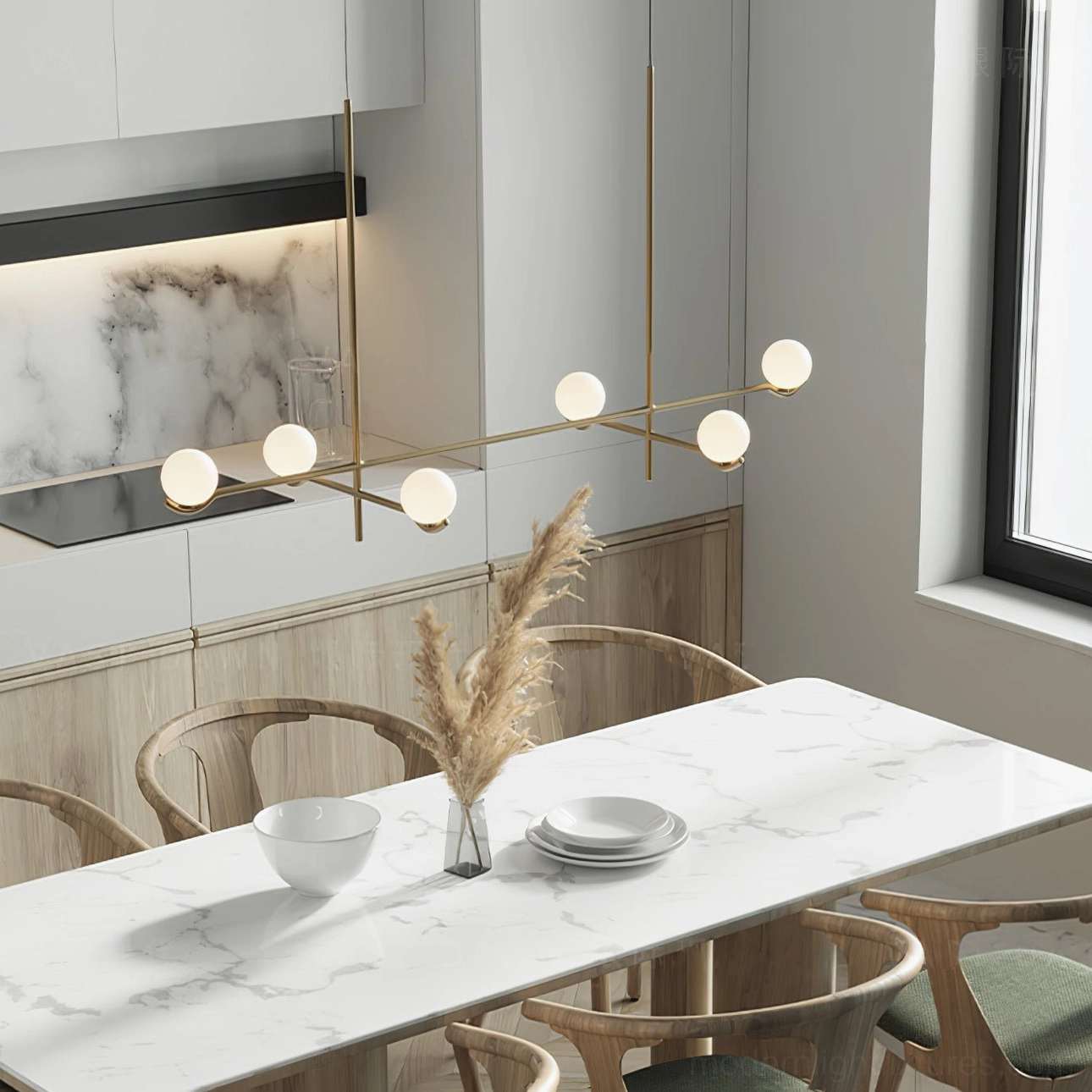 Long linear 6-head Sullivan Chandelier with brass gold frame and frosted glass shades over kitchen island