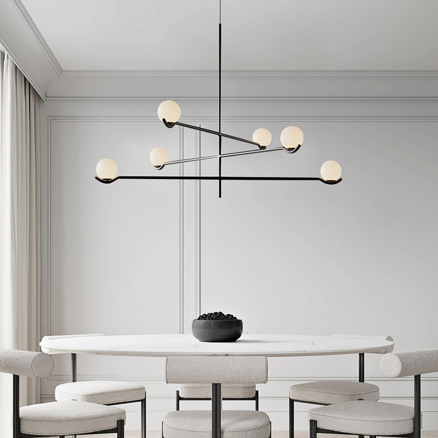 Modern lighting design featuring spliced metal poles and frosted glass orbs with adjustable height