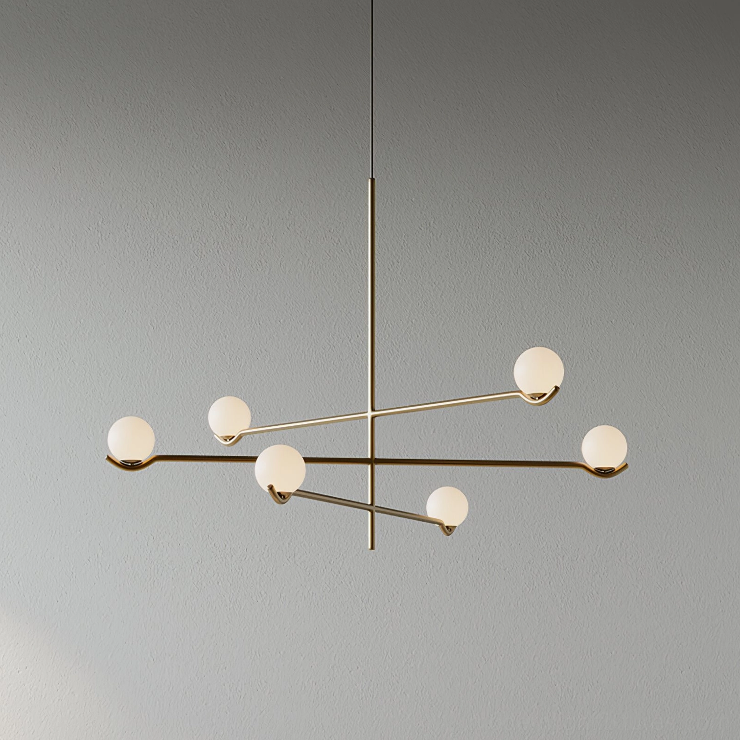Modern lighting fixture with asymmetrical arm configuration and opal glass globe shades in living space