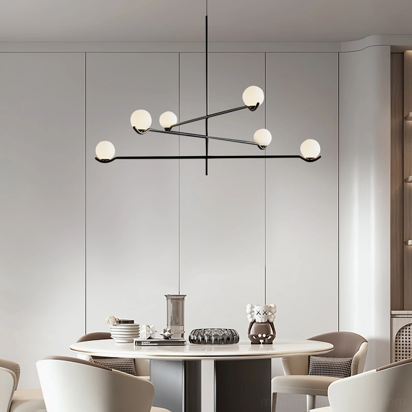Modern asymmetrical sputnik pendant chandelier with frosted white glass globes in minimalist dining room