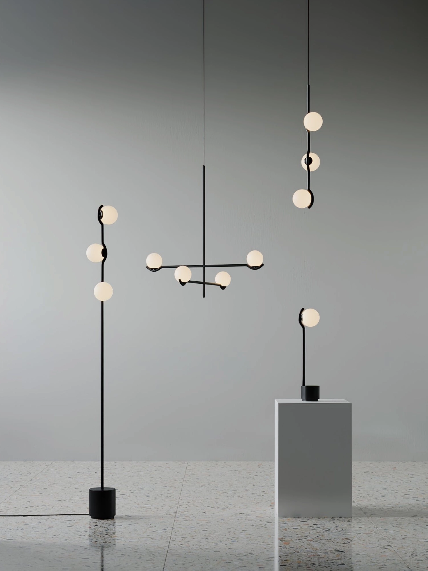 Statement chandelier with asymmetrical arm design and frosted globe shades for modern spaces