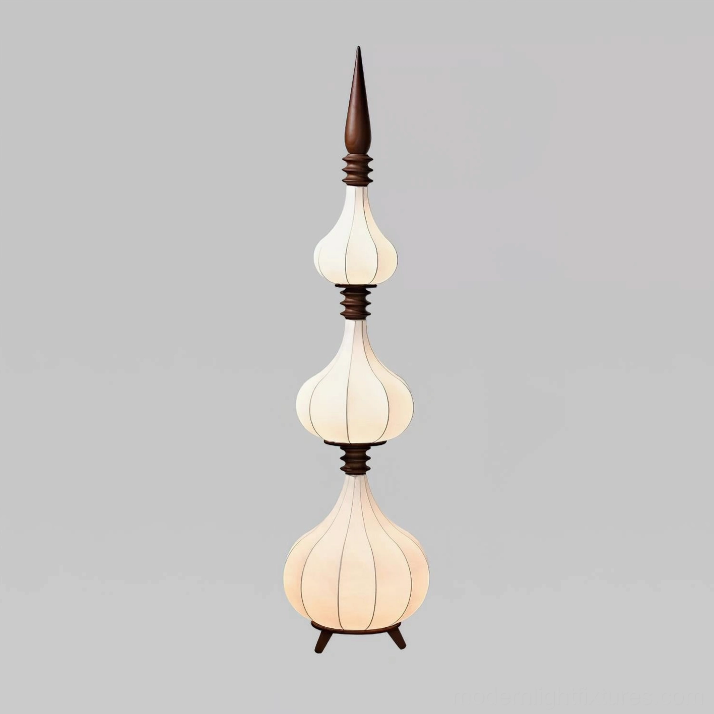 Sultano floor lamp detail showing walnut wood tripod base and ribbed white fabric shade construction