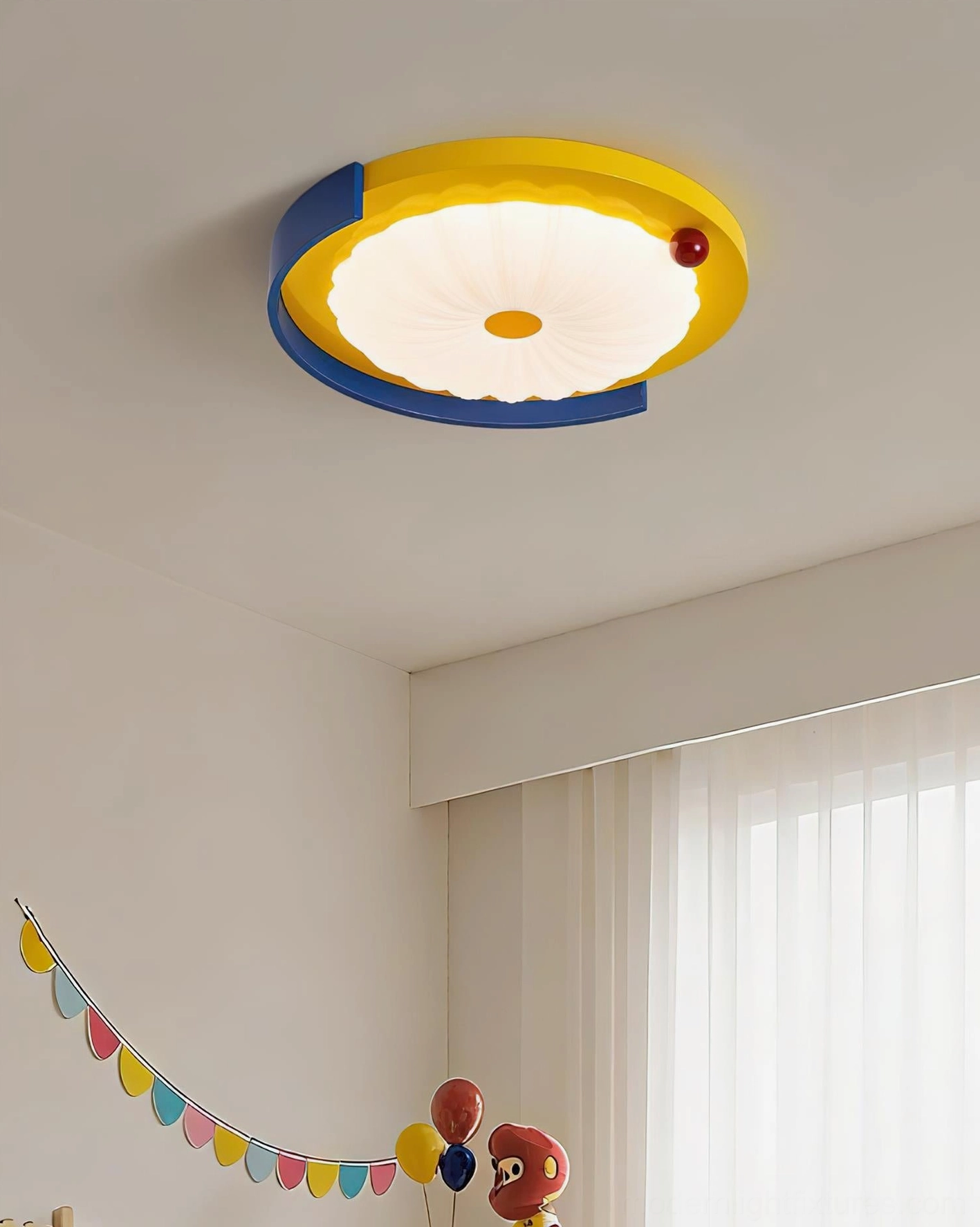 Sunpetal playful color-blocked ceiling light installed overhead bedroom with party bunting decoration