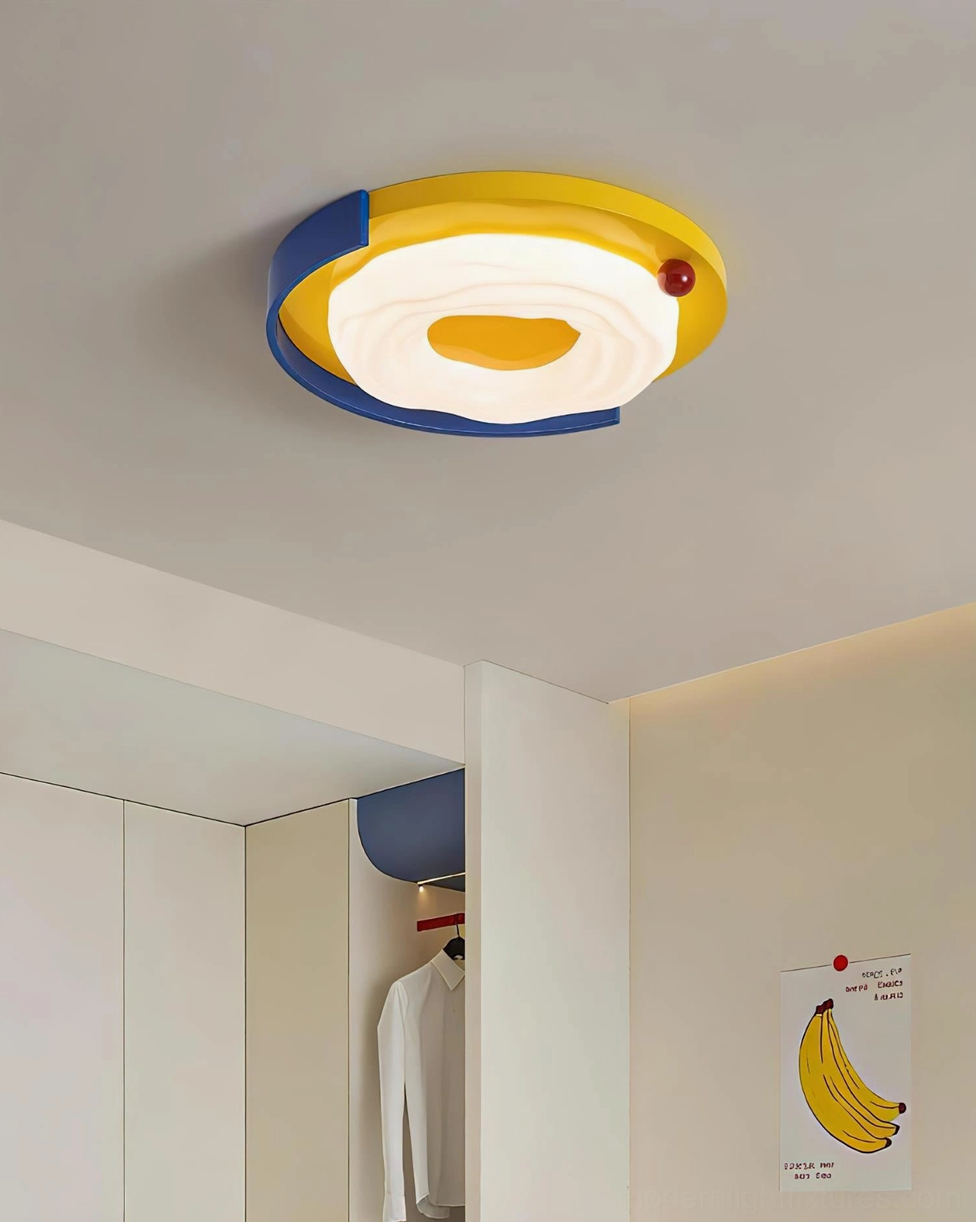 Sunpetal ceiling light installed overhead in bedroom closet with color-blocked blue and yellow frame and red accent detail