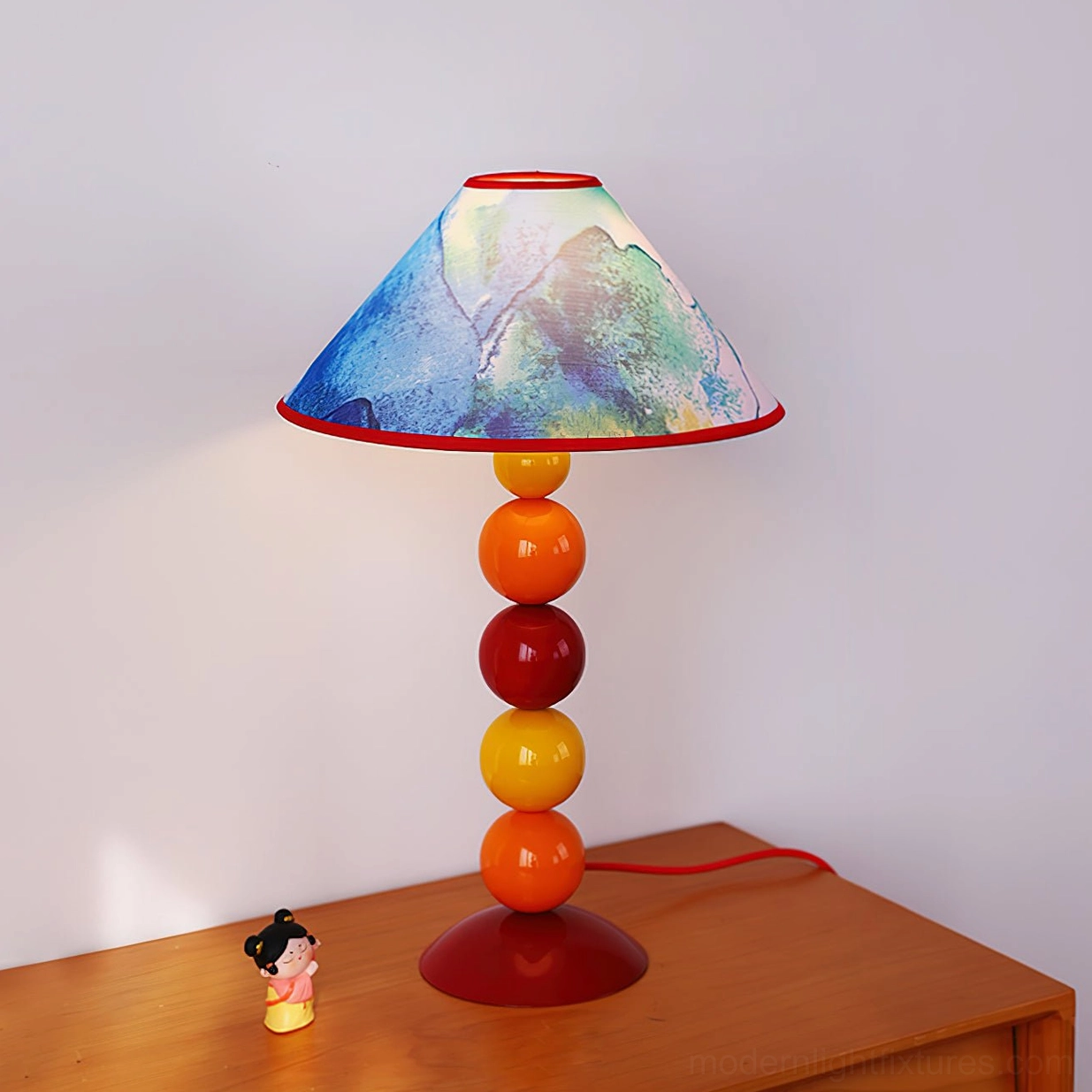 Artistic table lamp with blue watercolor printed shade on wooden furniture - modern bohemian home decor accent lighting