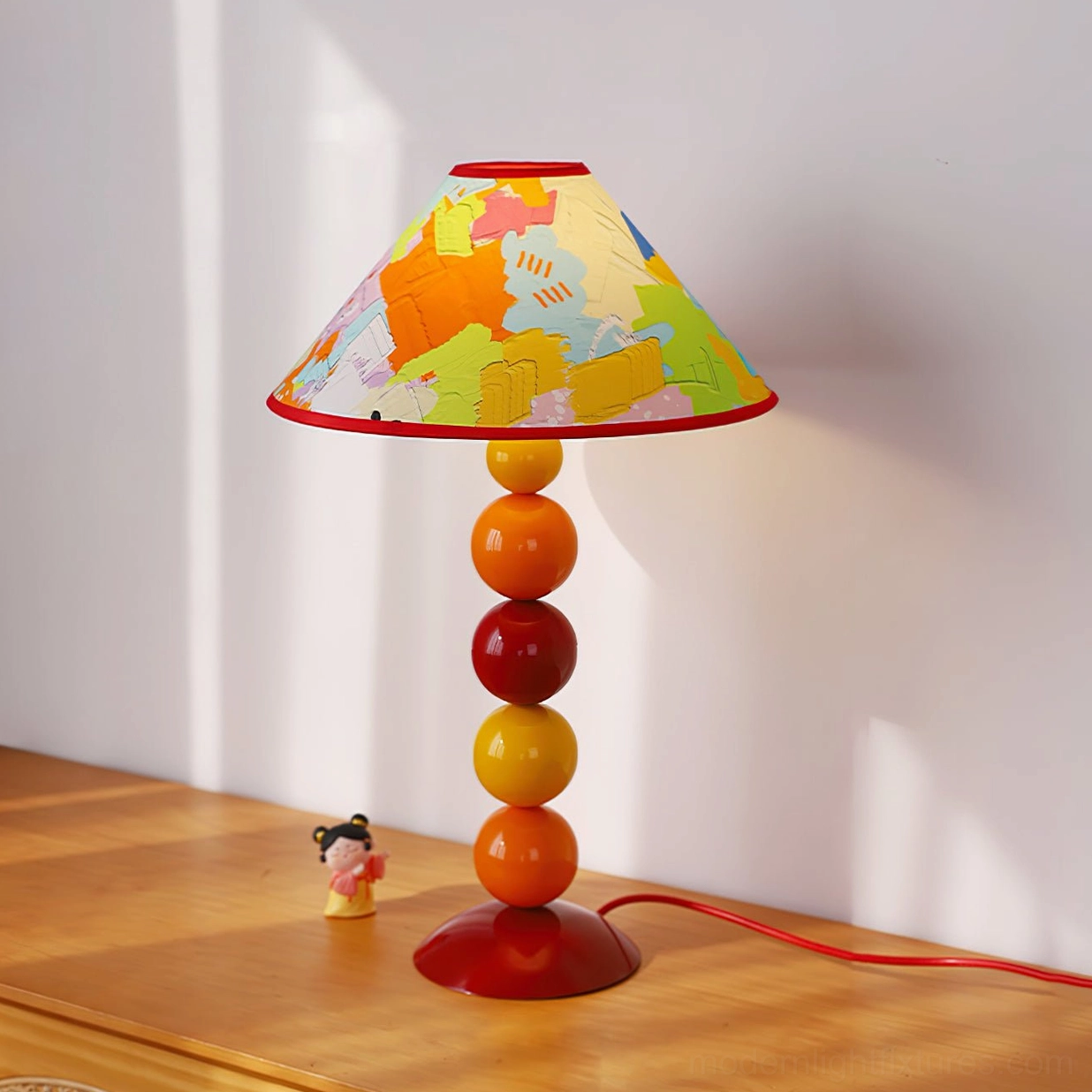Blue watercolor gradient printed lampshade on decorative beaded table lamp with warm spherical base - contemporary artistic home lighting